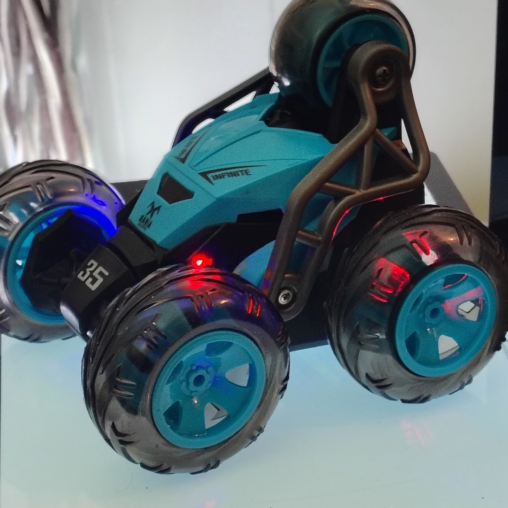Tyco Turbo Blue LED Stunt RC Car – All-Terrain 360° Roller